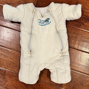 Baby Merlin's Magic Sleepsuit Cream Pajamas